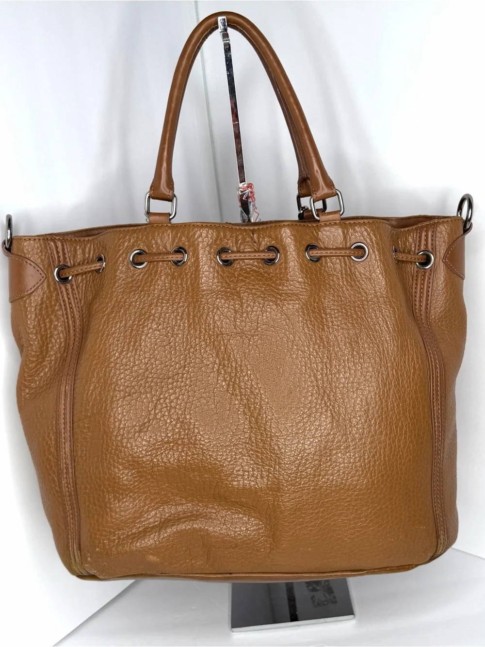 Stylish Tan Leather Satchel with Tassel Charm
